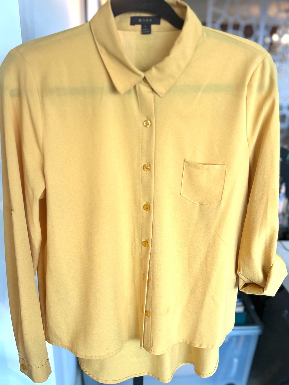 Mine New York boutique mustard Button-Up Shirt with adjustable sleeves.